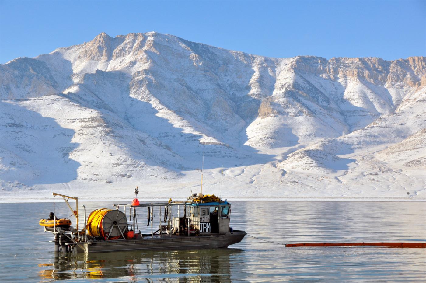 Great Salt Lake Artemia harvester watercraft harvesting brine shrimp eggs during winter harvest season. Courtesy Great Salt Lake Artemia.