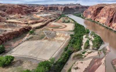 The 180-acre Kane Creek development site, which is in a floodplain, is pictured along the Colorado River near Moab on Friday, April 26, 2024. Developers plan to build around 580 residential and commercial units. There is only one road in and out. | Kristin Murphy, Deseret News