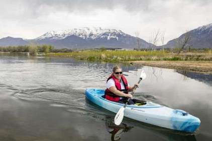 Amalie Simper, of Provo, kayaks on the Provo River Delta near the Skipper Bay Trailhead and Utah Lake in Provo on Wednesday. The Utah Lake Authority is increasing efforts to improve the public perception of Utah Lake. Amalie Simper, of Provo, kayaks on the Provo River Delta near the Skipper Bay Trailhead and Utah Lake in Provo on Wednesday. The Utah Lake Authority is increasing efforts to improve the public perception of Utah Lake. (Isaac Hale, Deseret News) 